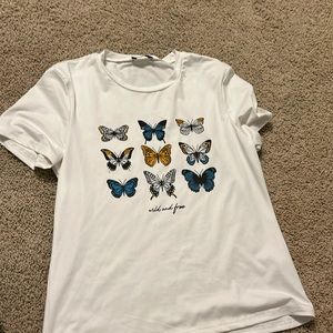 White shirt with butterflies